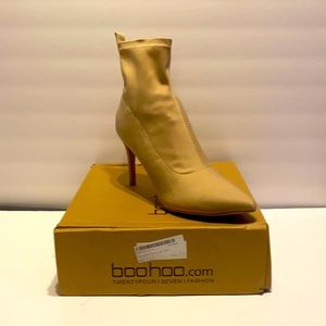 BooHoo,, ankle heel booty In a tan color